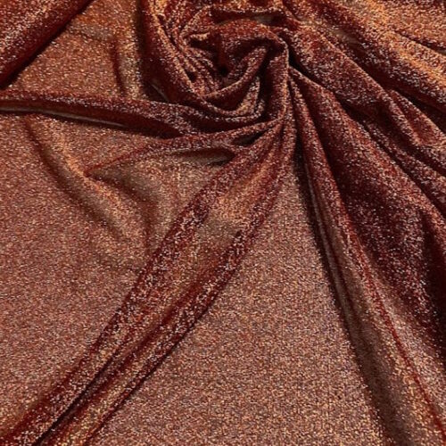 Tessuto maglina lurex leggera  fondo nero lurex bronzo art. 532/3 1mt.xh.150cm.