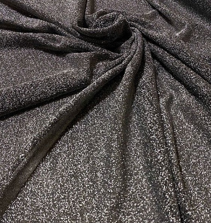 Tessuto maglina lurex leggera fondo nero lurex argento art. 532/7 1mt.xh.150cm.