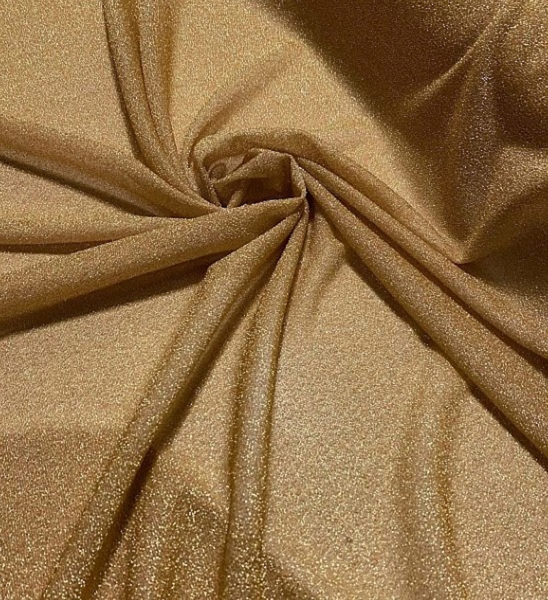 Tessuto maglina lurex leggera oro art. 532/65 1mt.xh.150cm.